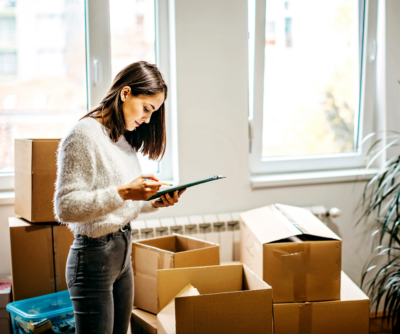 Woman making a moving list